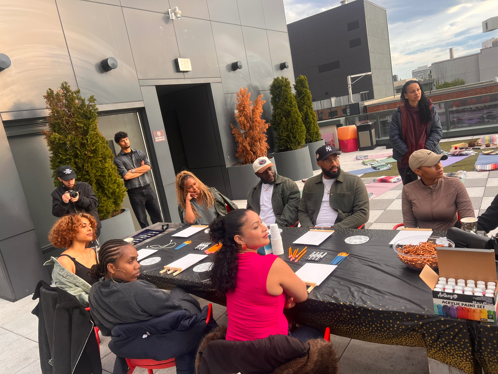 Participants gathered around a creative arts table during a wellness event